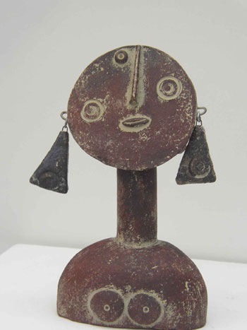 John Maltby Queen with long earrings